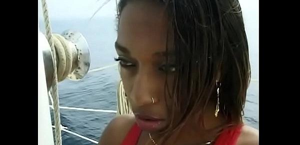  Luxurious black whore takes white cock for a lot of semen on the yacht